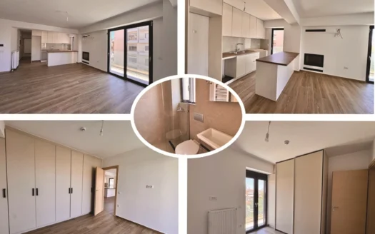 Open-plan living area with wood floors, white kitchen cabinets and a large glass patio door leading to a balcony.